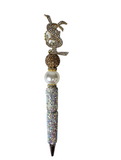 Signed in Luxury | Gold Monogram Crystal Topper & White Pearl Pen
