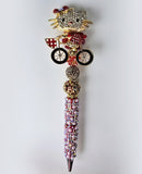 Main Character on the Move | Crystal Hello Kitty, Red Pearl & Gold Luxe Pen