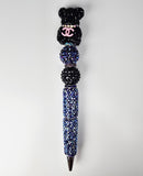 She Carries Chanel | Black Crystal Bear Topper, Pink CC & Deep Blue Pen
